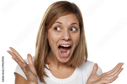 horrified young woman without make-up