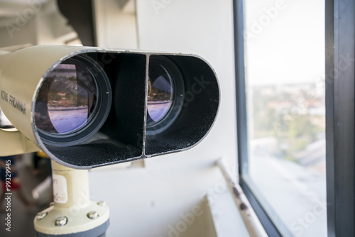 Binocular looking out of the window. - binocular for viewing