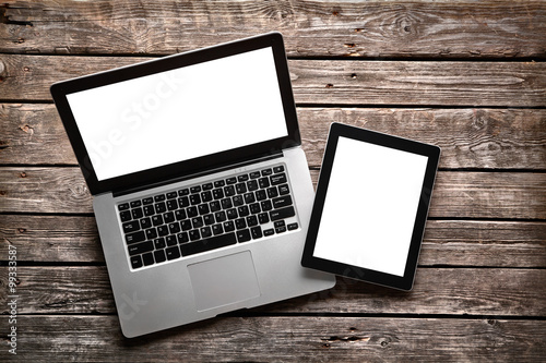 Open laptop with digital tablet