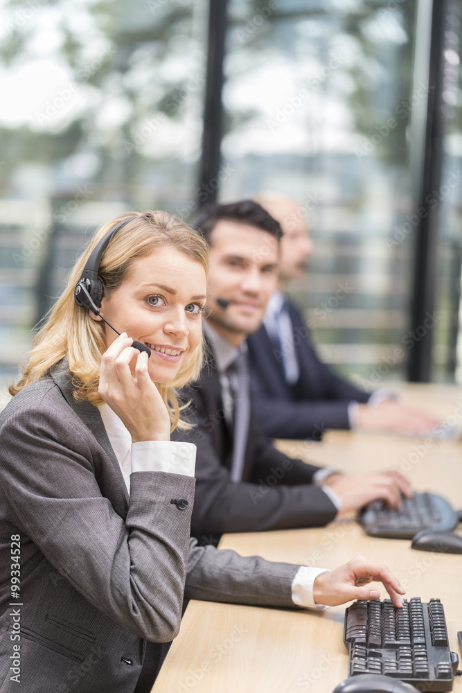 Young attractive woman working in a call center Young attractive woman working in a call center