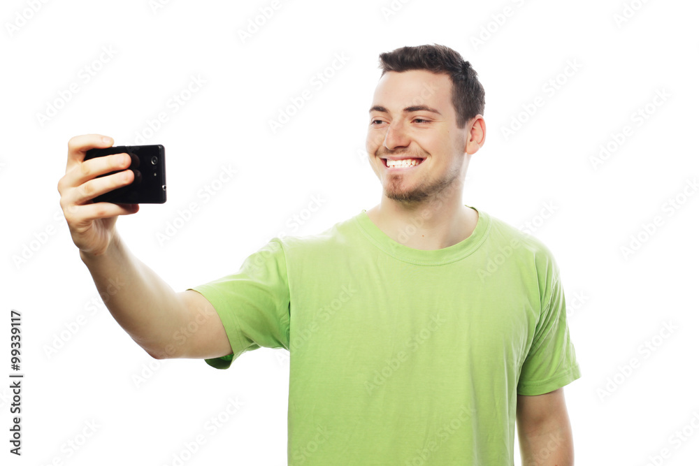 young man making photo of himself young man making photo of himself