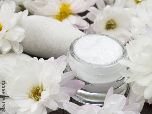 facial cream with fresh flowers