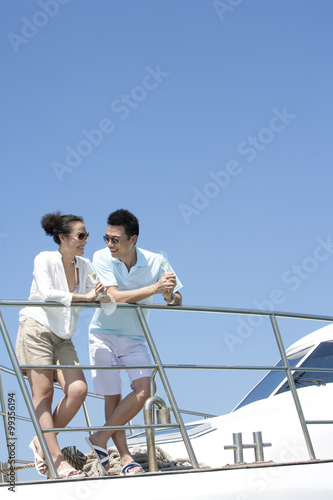 Drinking Champagne on a Yacht © Blue Jean Images