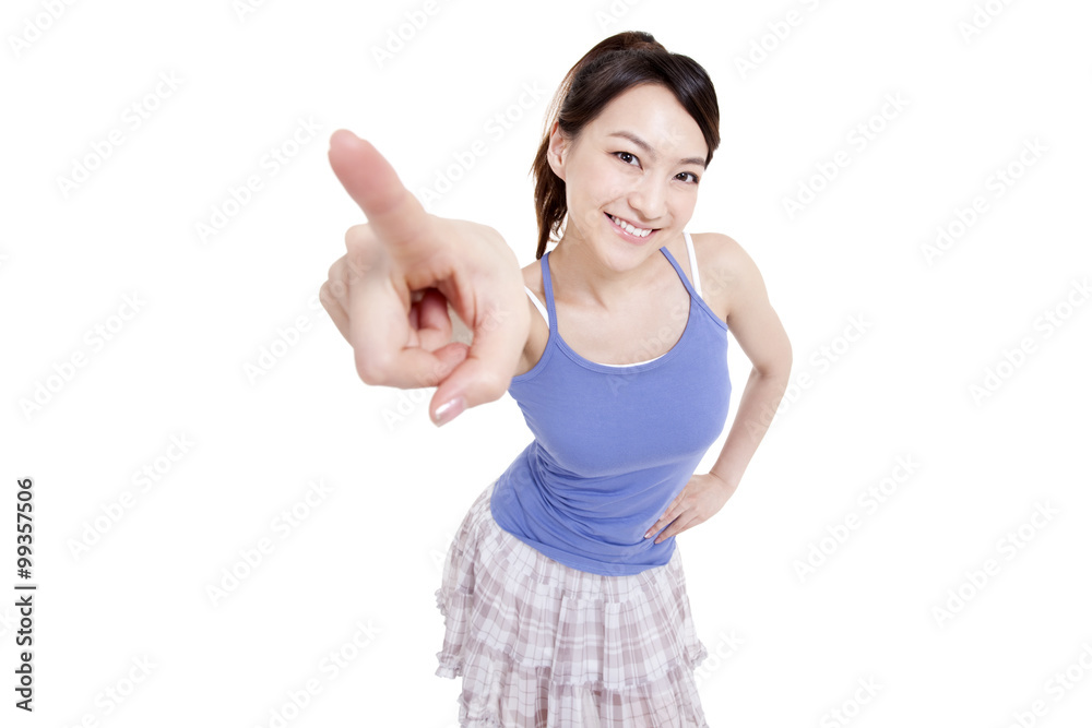 Cheerful young woman pointing forward Cheerful young woman pointing forward