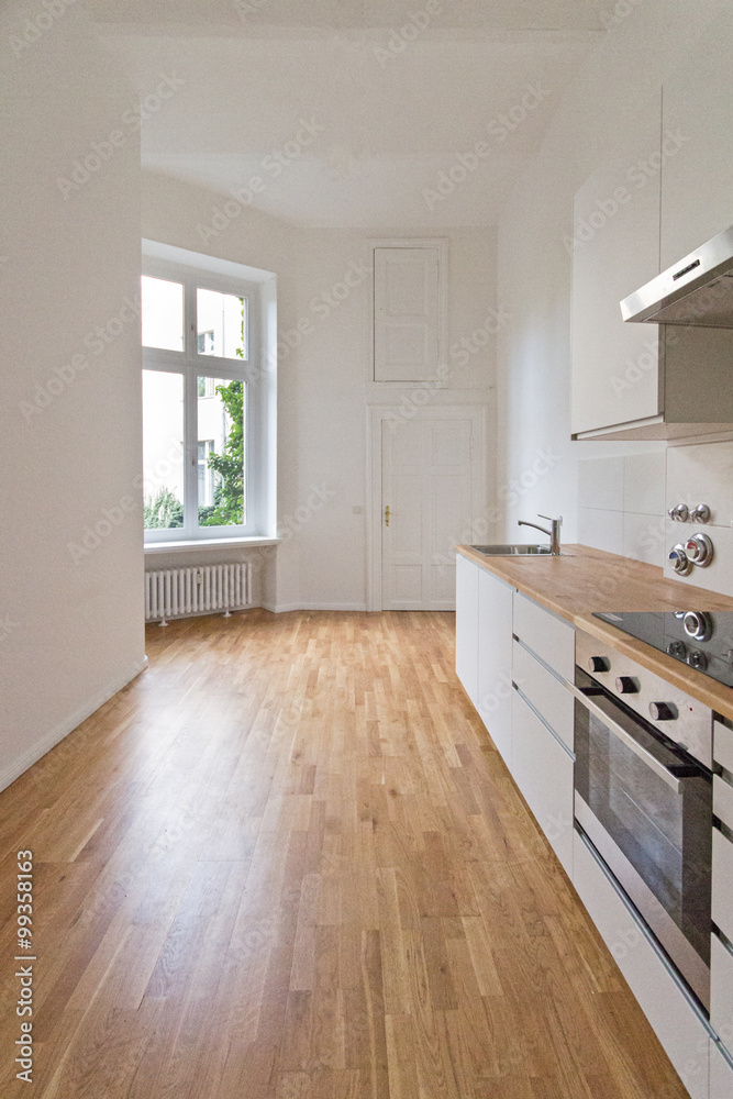 empty kitchen, fresh renovated flat with wooden floor,