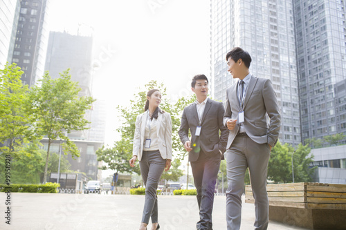 Young business person talking outdoors