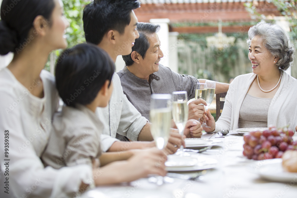 Family eating holiday meal together Family eating holiday meal together