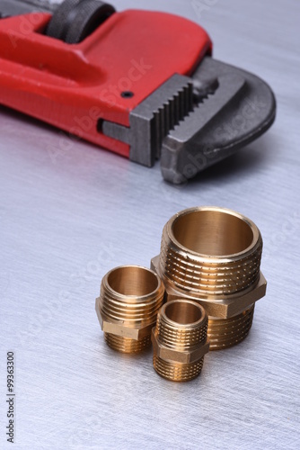 Equipment Plumbing & Heating Contractors, brass plumbing parts with wrench