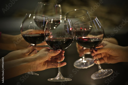 Glasses of red wine on a cheerful holiday