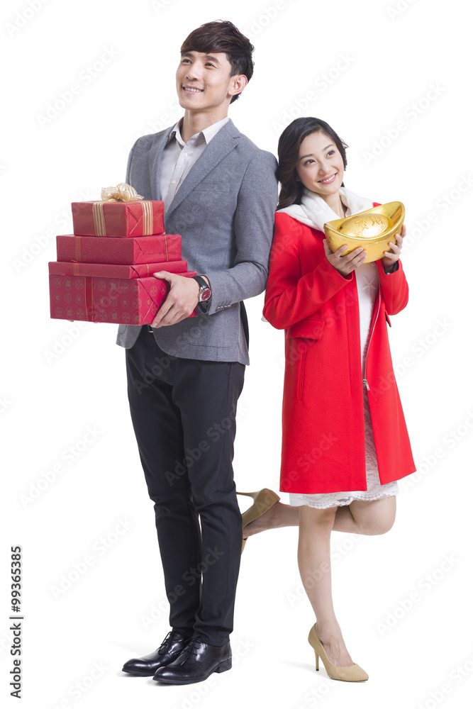 Happy young couple celebrating Chinese New Year Happy young couple celebrating Chinese New Year