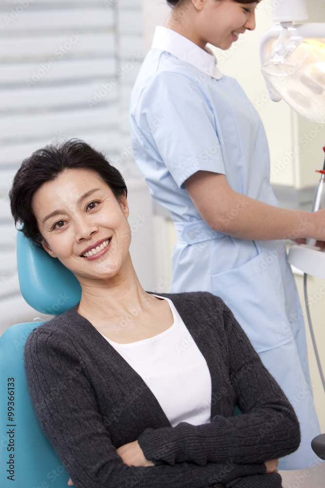 Patient receiving treatment in dental clinic Patient receiving treatment in dental clinic