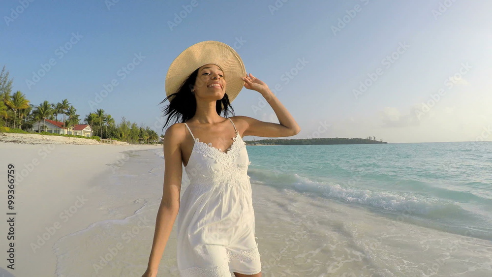 African American female enjoying freedom on tropical beach African American female enjoying freedom on tropical beach