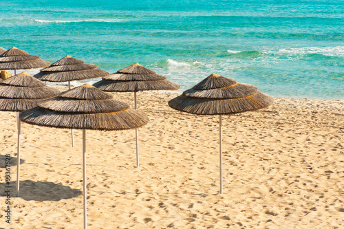 Umbrellas on the seaside photo