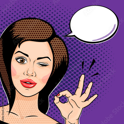 Pop art comics style Playful young woman winking and showing ok hand sign. Vector illustration
