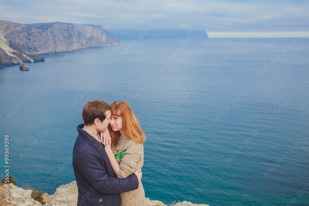 couple in love relaxing, mountain Coast