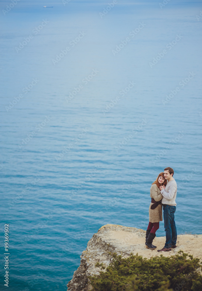 couple in love relaxing, mountain Coast