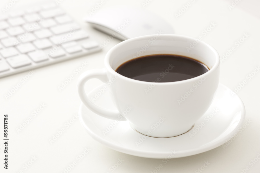 Coffee and computer on office desk Coffee and computer on office desk