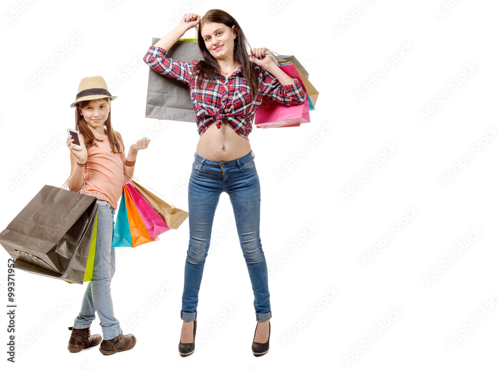 beautiful girl and her little sister go shopping during sales beautiful girl and her little sister go shopping during sales