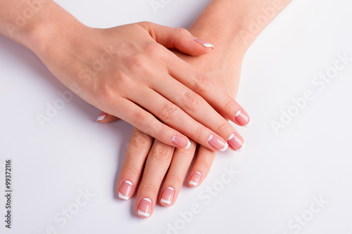 Woman's manicure on a white background.