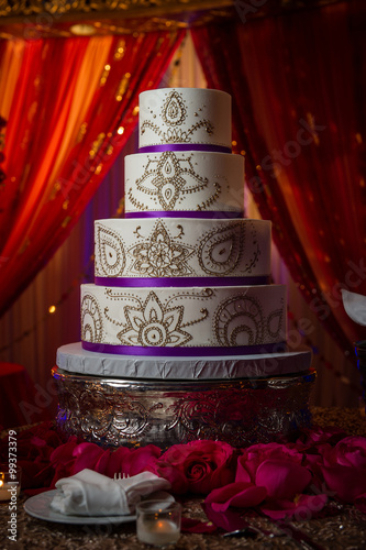 Decorative Gold and Purple Indin Wedding Cake photo