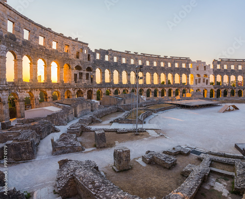 Inside of Ancient Roman Amphitheater in Pula, Croatia, Famous Travel Destination, in Sunny Summer Evening