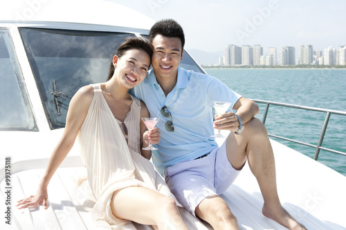 Couple Relaxing on a Yacht