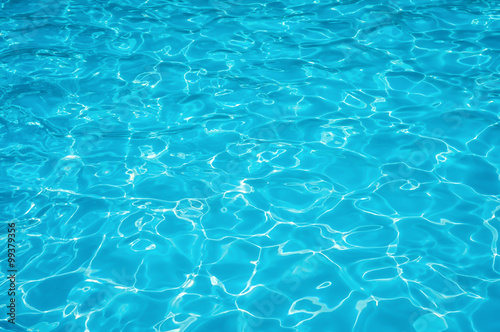 Blue and Bright  water surface  in swimming pool photo