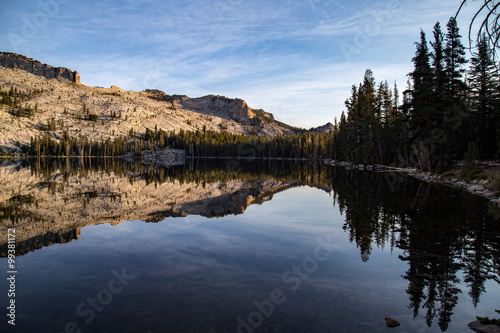 Fototapeta Naklejka Na Ścianę i Meble -  Reflection of mountains in water at sunset Yosemite National Par