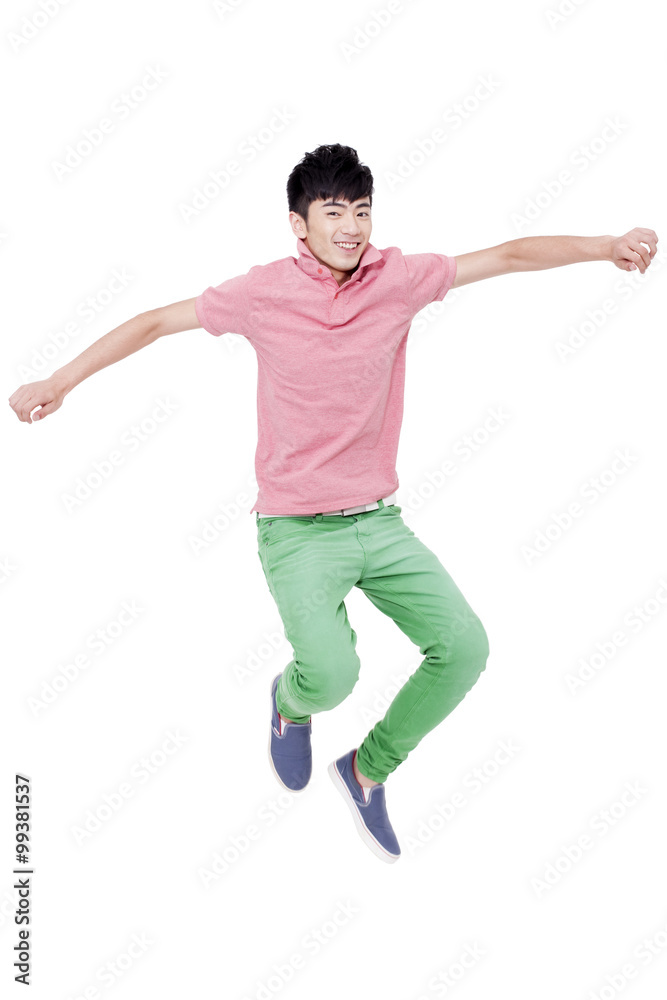 Happy young man jumping