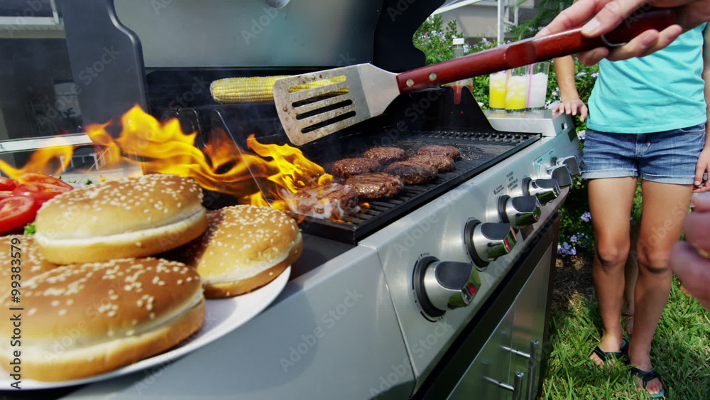 Outdoor Grill Food Cooking Healthy Lifestyle Caucasian Family Bright Clothes 