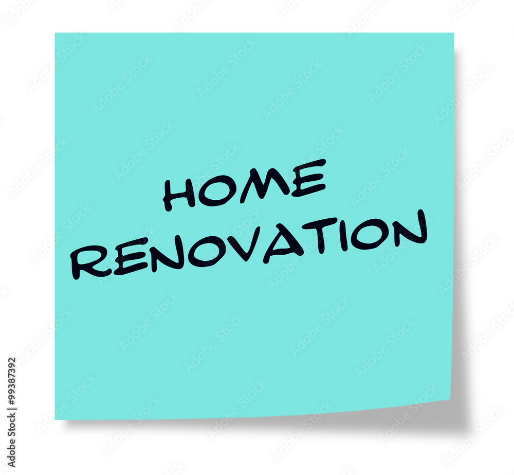 Home Renovation written on a blue sticky note Home Renovation written on a blue sticky note