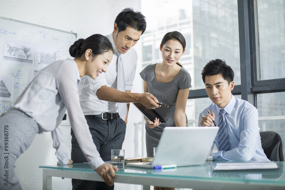 Young business people talking in meeting Young business people talking in meeting