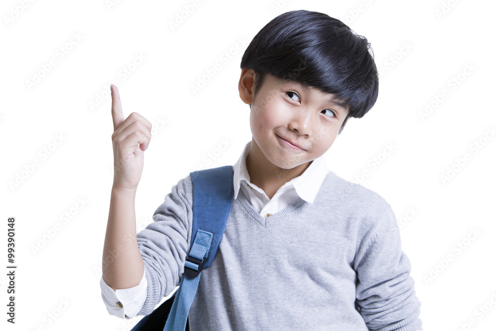 Cute schoolboy raising his finger Cute schoolboy raising his finger