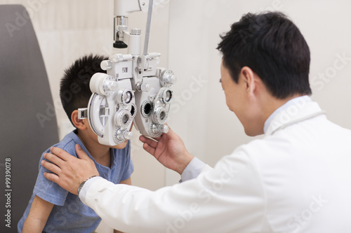 Boy receiving eyes examining