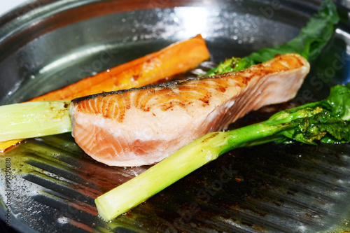 salmon steak and grilled vegetable photo