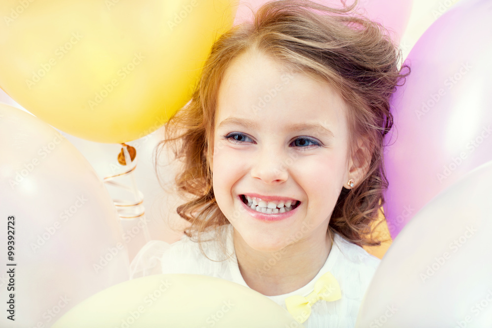 Portrait of happy child on balloons background Portrait of happy child on balloons background