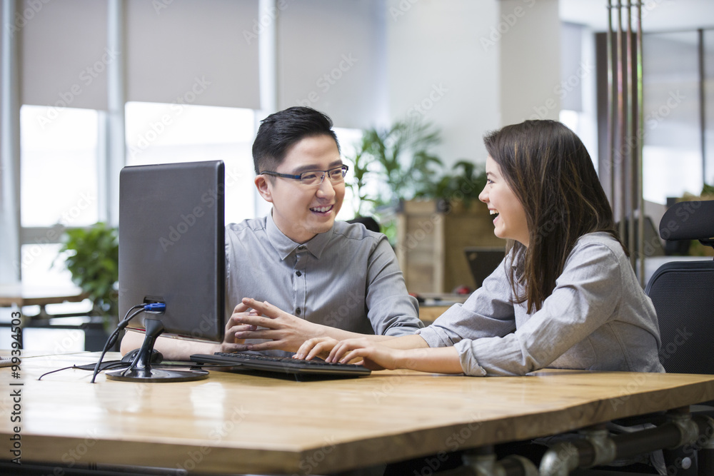 IT workers talking in office
