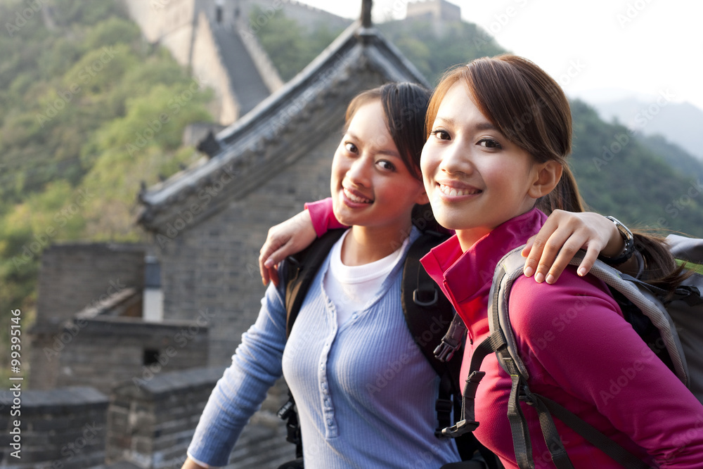 Young people go hiking on the Great Wall