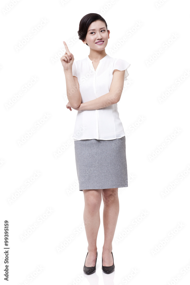 Confident businesswoman raising index finger up Confident businesswoman raising index finger up