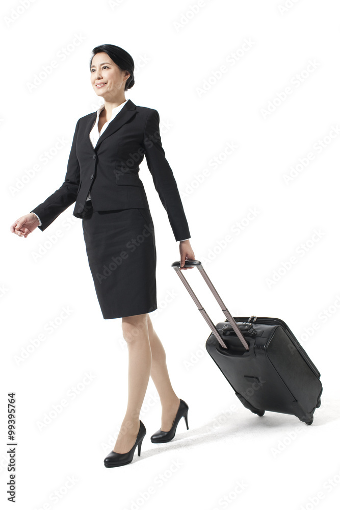 Happy businesswoman with her luggage on a trip Happy businesswoman with her luggage on a trip