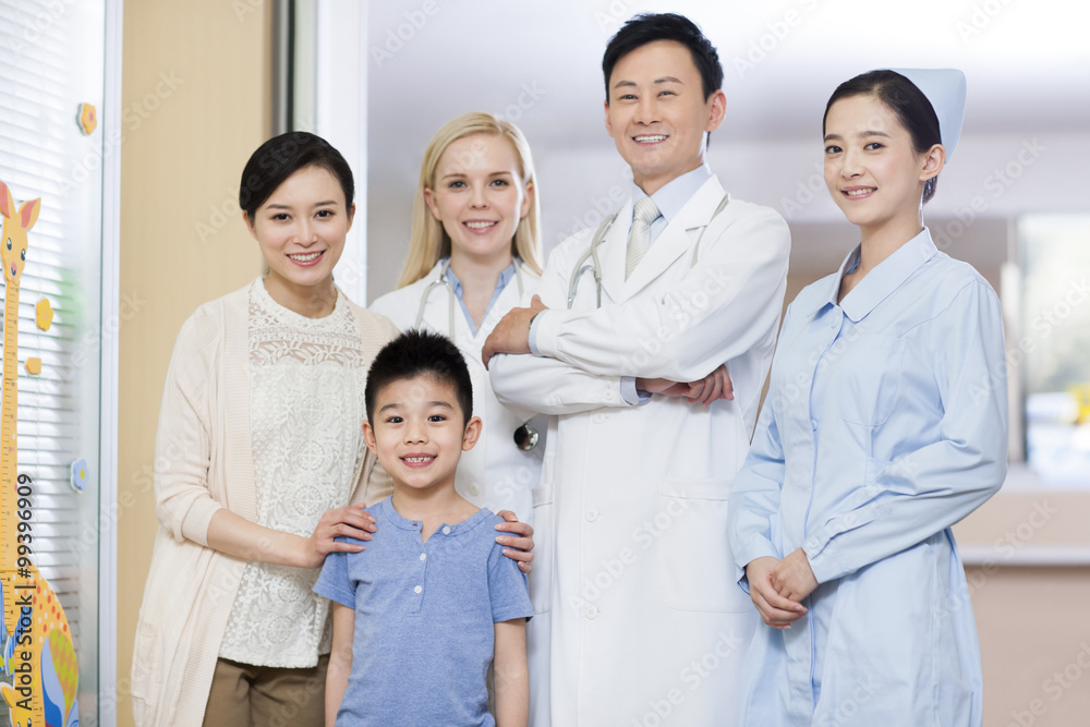 Doctors and nurse with patient in children's hospital Doctors and nurse with patient in children's hospital