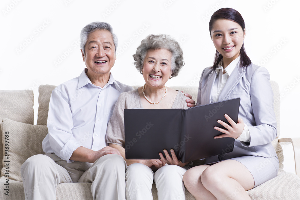Senior couple with financial advisor Senior couple with financial advisor