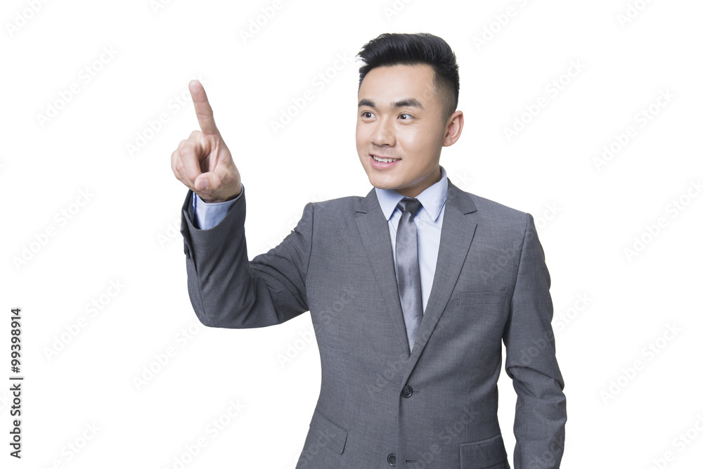Young businessman using finger to point Young businessman using finger to point