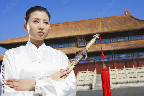 Portrait Of Young Woman Practicing Martial Arts photo