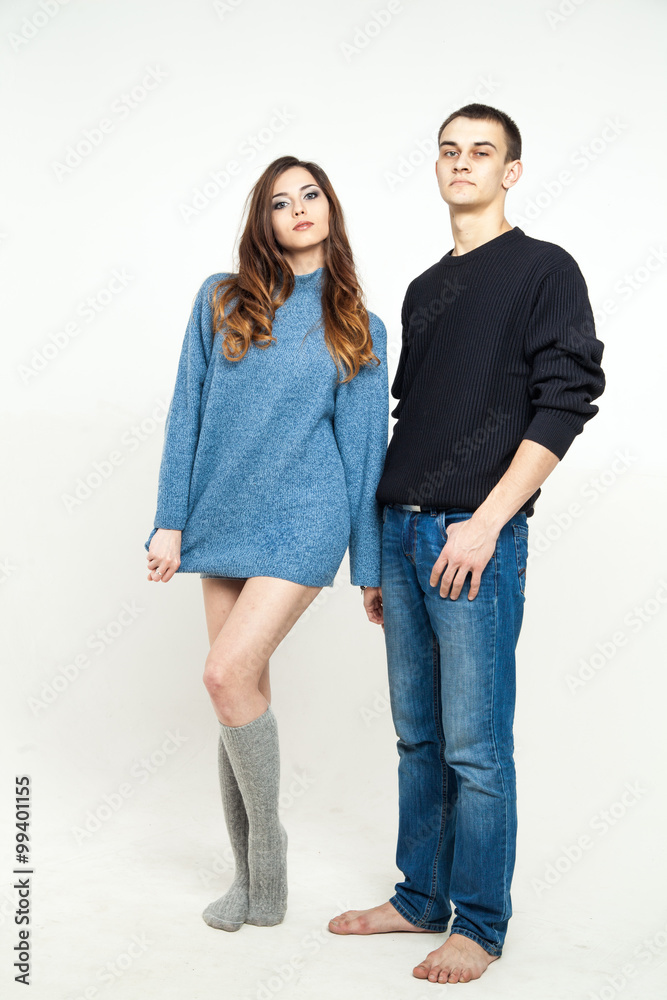 Portrait of happy couple isolated on white background. Attractive man and woman being playful.