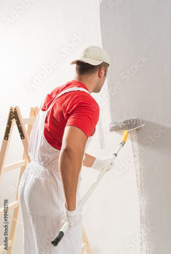 Fotografie Painting Wall With Roller