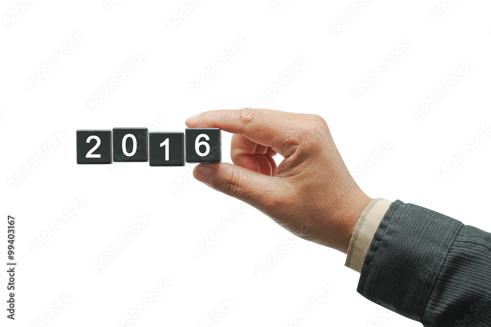 Hand withblack number square dice 2016. Hand withblack number square dice 2016.