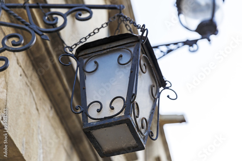Old street lamp on the wall