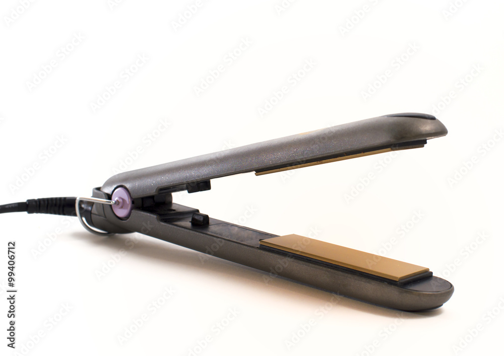 Ceramic hair straightener on white background Ceramic hair straightener on white background