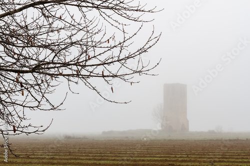 Torreón de Fresno de la Valduerna entre la niebla, León.
 photo